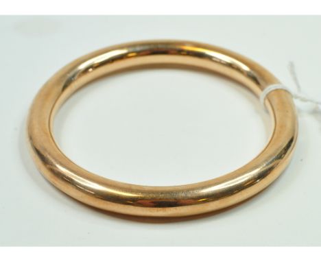A 9ct gold bangle, approx. 17.1 g   Condition report  Report by RBNumerous dents, mostly to the rim, commensurate with wear
