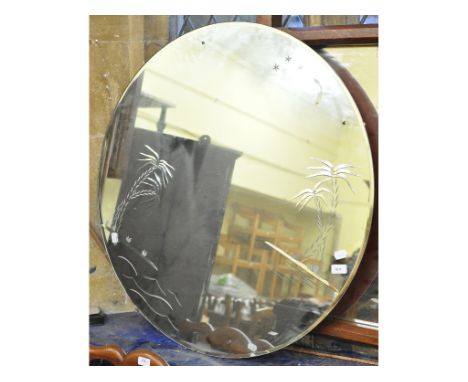 An Art Deco style wall mirror, decorated palm trees, 91 cm diameter   Condition report  Slightly chipped 