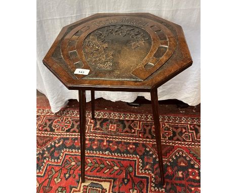 A naively carved octagonal occasional table with Good Luck motif 