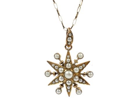 A vintage gold and imitation-half-pearl 'starburst' pendant in Victorian style, and a chain. The pendant unmarked, approx. 27