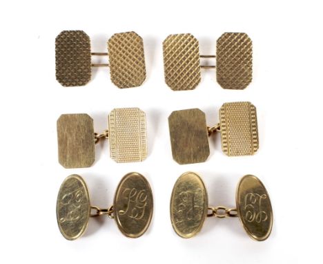 Three pairs of vintage 9ct gold cufflinks. Comprising; a pair of oval twin-panel cufflinks engraved with script initials and 
