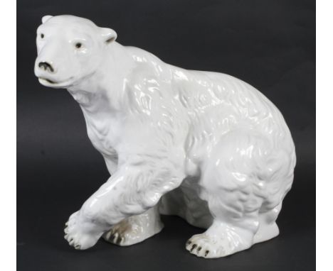 A 20th century Royal Dux porcelain model of a polar bear. Printed green marks, applied pink pad marks, numbered 398/30, natur