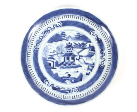 A Chinese Export porcelain blue and white plate, Qing Dynasty. Decorated with a person crossing a bridge before pavilion and 