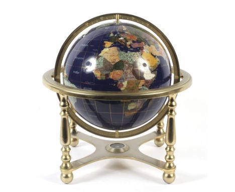 A Lapis Globe mounted with mineral and semi-precious stones. With paperwork referencing the 30 different minerals and semi-pr