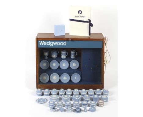 A retro Wedgwood cabinet top shop display case and a collection of Wedgwood miniature jasperware. 20th century, impressed upp