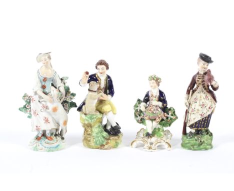 A group of Derby porcelain figures. The first circa 1775, modelled as a shepherdess with sheep, 14.4cm high a Bloor figure, c