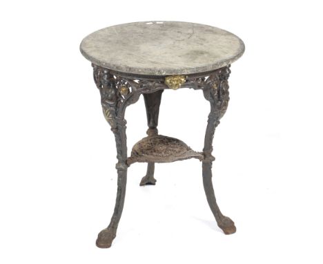 A Victorian cast iron pub table. With pierced gilt cast iron Britannia supports, with pierced foliate shelf, H73cm x 60.3cm d