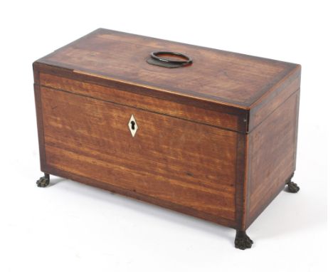 A Georgian fruitwood tea caddy. Of rectangular form, crossbanded with oval brass handle to top, fitted with three divisions, 
