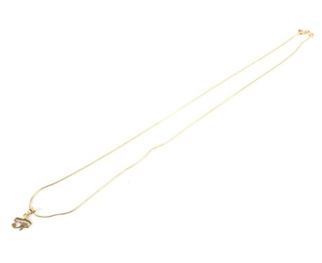 An Egyptian yellow metal cable-link necklace and pendant. The necklace on a bolt-ring clasp, approx 48cm long; hung with a sm
