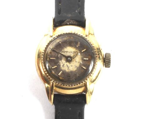 A ladies 18ct gold cased manual wind Movado wristwatch. The circular dial with gilt batons denoting hours, with beaded decora