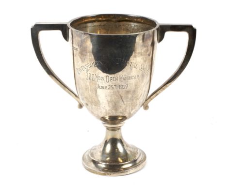 A silver twin handled pedestal  trophy. With inscription 'Ravensbourne 56th Annual Sports, 300yds Open Handicap, June 25th 19