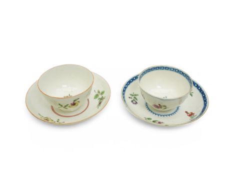 Worcester tea bowl and saucer, c.1770, painted with polychromatic floral sprays within blue borders, bearing crescent marks t