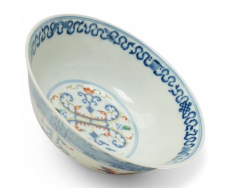 19th century Chinese  Doucai porcelain bowl decorated in blue, orange etc, the interior with a double scroll panel, six chara