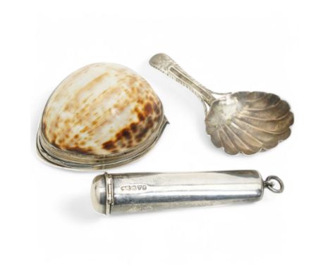 Early 19th century silver mounted cowrie shell snuff box with engraved decoration, George IV silver caddy spoon and a silver 