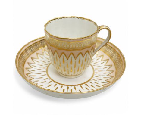 Derby coffee cup and large saucer, pattern 119, c.1795, the apricot ground decorated with gilt teardrop motifs and intricate 