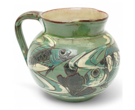Late 19th century C H Brannam pottery Barum ware sgraffito jug, in green and brown glaze, decorated with fish swimming amongs