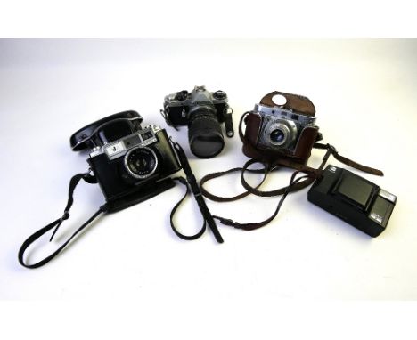 Four vintage cameras, Pentax ME Super, Yashica J, Minolta Auto Focus and Agimatic