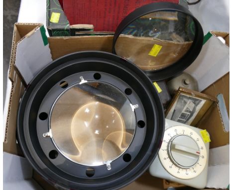Two large lenses, Junghans timer, vintage bell and train picture
