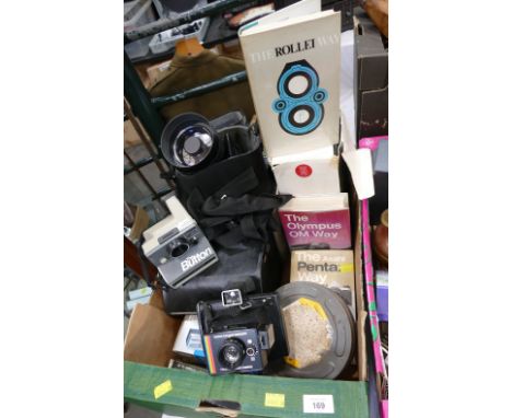 Box of camera equipment, vintage cameras, Polaroid Button, Vivitar Catadioptric telephoto lens, vintage camera books etc