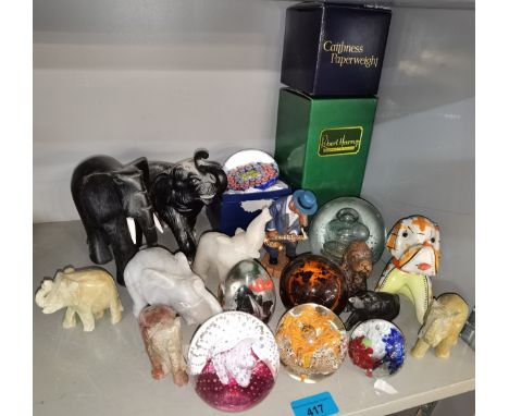 A quantity of glass paperweights to include Caithness and a Mille Fleurie example, together with ornamental models of animals