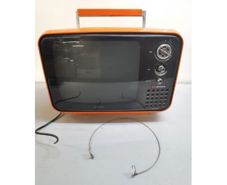 A retro Hitachi Solid State television in bright orange Location: LAF 