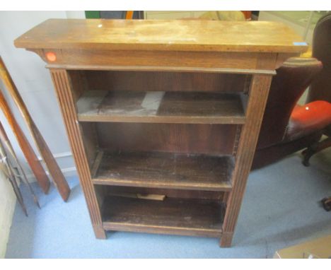 An early 20th century oak three tier bookcase having reeded sides and on bracket feet 113cm h x 91.5cm w 