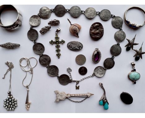 Silver and white metal jewellery and coins to include a Victorian silver engraved bangle having a belt design, a mid 19th Cen