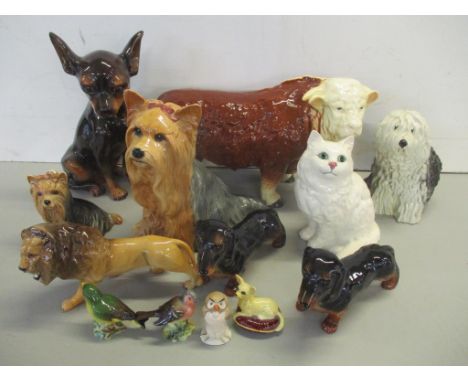 A selection of animal ornaments to include Beswick dogs, Walt Disney Beswick owl, Melba bull and others 