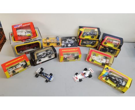 A group of F1 Diecast model cars to include a boxed Corgi 158 Elf Tyrrell-Ford F1, Corgi 152 Ferrari 312 B2, Corgi 161 Elf-Ty