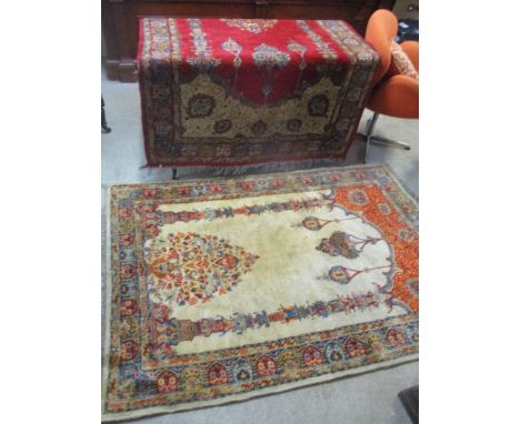 Two rugs to include  a Persian beige ground rug with lamp ornament and multiguard borders 186cm x 131.5cm 