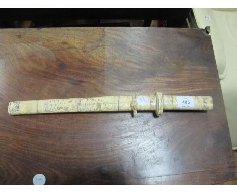 AN ORIENTAL DAGGER in simulated ivory case 45cm long