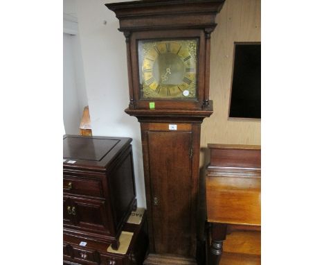 AN 18TH CENTURY OAK LONG CASE CLOCK the outset moulded halt above a glazed door between cylindrical half pilasters containing