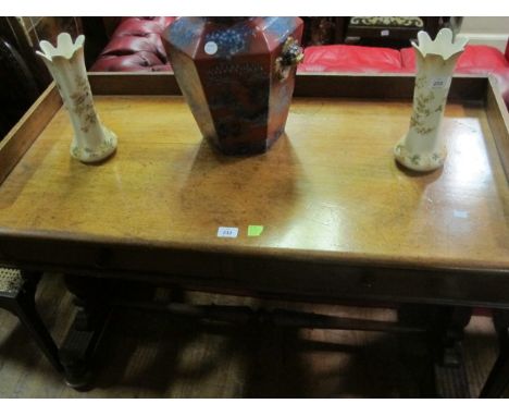 A VICTORIAN MAHOGANY SIDE TABLE the rectangular top with moulded three quarter gallery with two frieze drawers on standard en