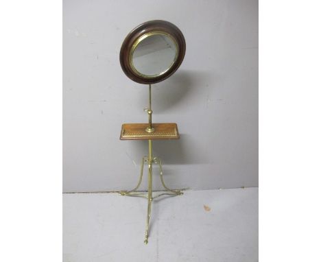 A VICTORIAN MAHOGANY AND BRASS DRESSING STAND the circular mirror above a telescopic column joined by a rectangular tray with