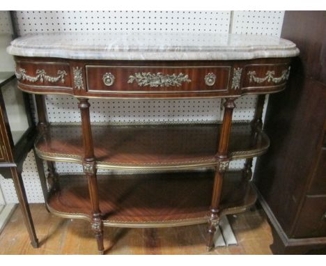 A GOOD CONTINENTAL KINGWOOD AND GILT BRASS MOUNTED SIDE TABLE surmounted with a vein marble top above a frieze drawer with gi