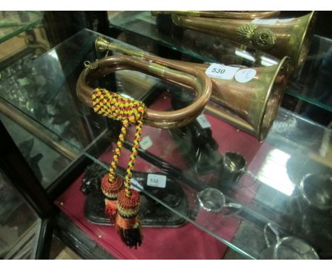 A COPPER AND BRASS BUGLE inscribed "Royal Welsh Fusiliers 23