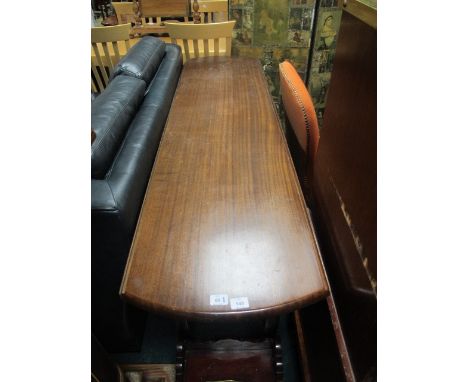 A GEORGIAN STYLE MAHOGANY HUNT TABLE the oval hinged top raised on square moulded legs 76cm (h) x 47cm (w) x 43cm (d)