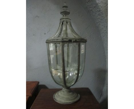 A METAL AND GLAZED LANTERN of octagonal tapering form the domed and hinged lid containing five night lights