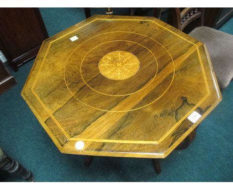 AN EDWARDIAN ROSEWOOD AND SATINWOOD INLAID OCCASIONAL TABLE of octagonal outline the shaped moulded top raised on moulded leg