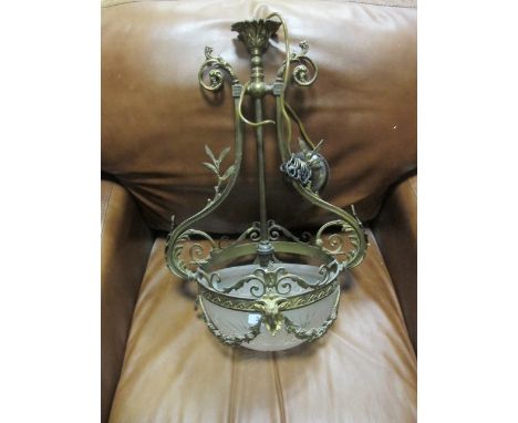 A VICTORIAN BRASS AND ENGRAVED GLASS CENTRE LIGHT the circlet with figural masks hung with floral festoons and foliate scroll