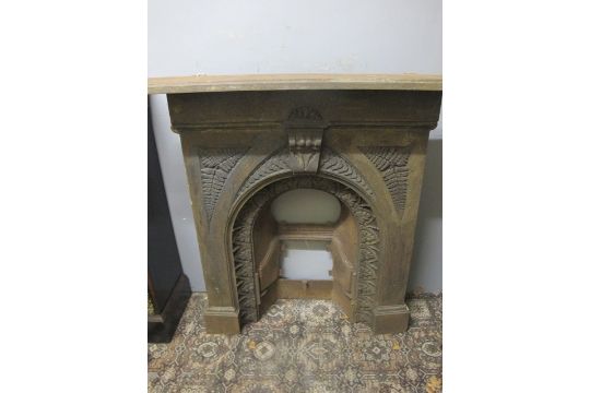 A Victorian Cast Iron Fireplace The Rectangular Shelf Above A
