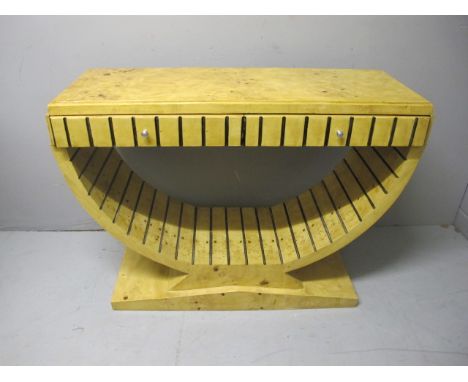 AN ART DECO STYLE WALNUT SIDE TABLE of rectangular outline the shaped moulded top with two frieze drawers raised on a U shape