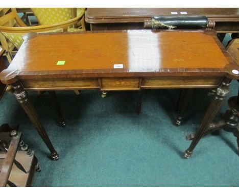 A CONTINENTAL MAHOGANY AND ROSEWOOD CROSS BANDED OCCASIONAL TABLE the rectangular top with eared corners above an inlaid frie