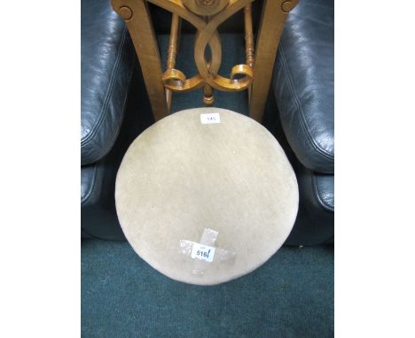 AN EDWARDIAN MAHOGANY REVOLVING STOOL the circular upholstered seat raised on turned legs joined by cross stretchers