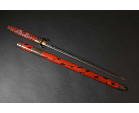 A Chinese jian short sword,Qing dynasty, with a straight pointed blade, red lacquered scabbard with metal mounts, with a carv