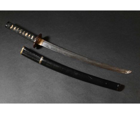 A Japanese wakizashi, Edo or Meiji, with a black lacquer saya (scabbard) and vacant kozuka, mounted with a white shagreen tsu