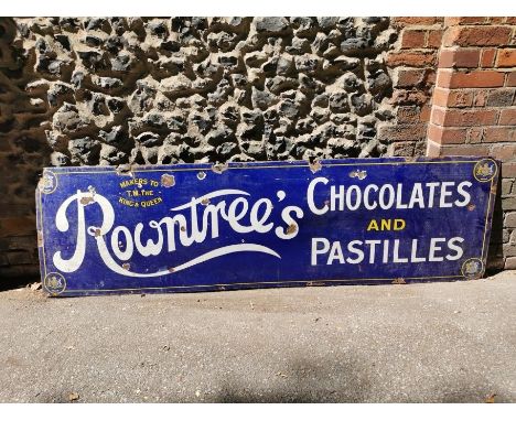 A vintage 'Rowntree's Chocolate and Pastilles' advertising enamel sign, with white lettering on a blue ground, 213.5 cm x 62 