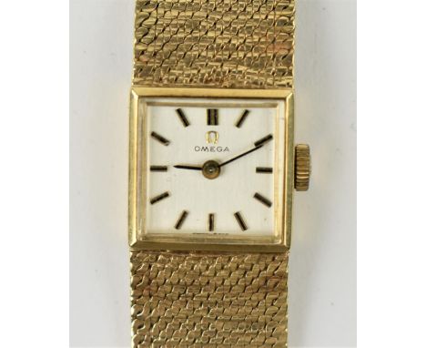 An Omega manual wind ladies, 9ct gold wristwatch, circa 1966, having a silvered dial with baton markers, Omega crown and brac