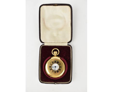 An early 20th century 18ct gold, half hunter pocket watch having a white enamel dial with blued hands, Roman numerals and sub