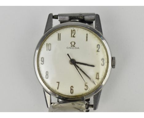 An Omega manual wind, gents stainless steel wristwatch, circa 1963 having a silvered dial with centre seconds and Arabic nume
